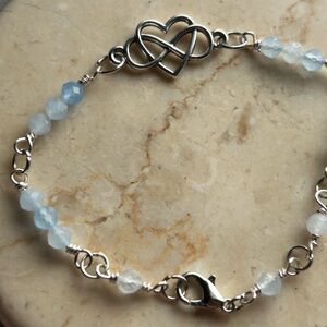 Silver Heart Knot and Aquamarine Blue Bead Bracelet